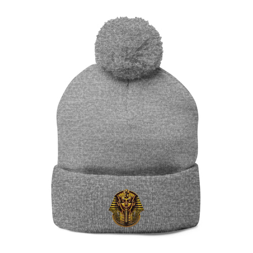 Cozy 100% acrylic pom-pom knit cap with embroidered fold-over cuff and playful pom-pom on top