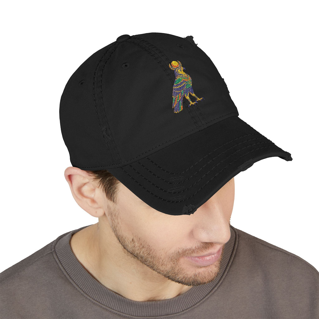 Distressed dad hat with Egyptian falcon and sun disk embroidery