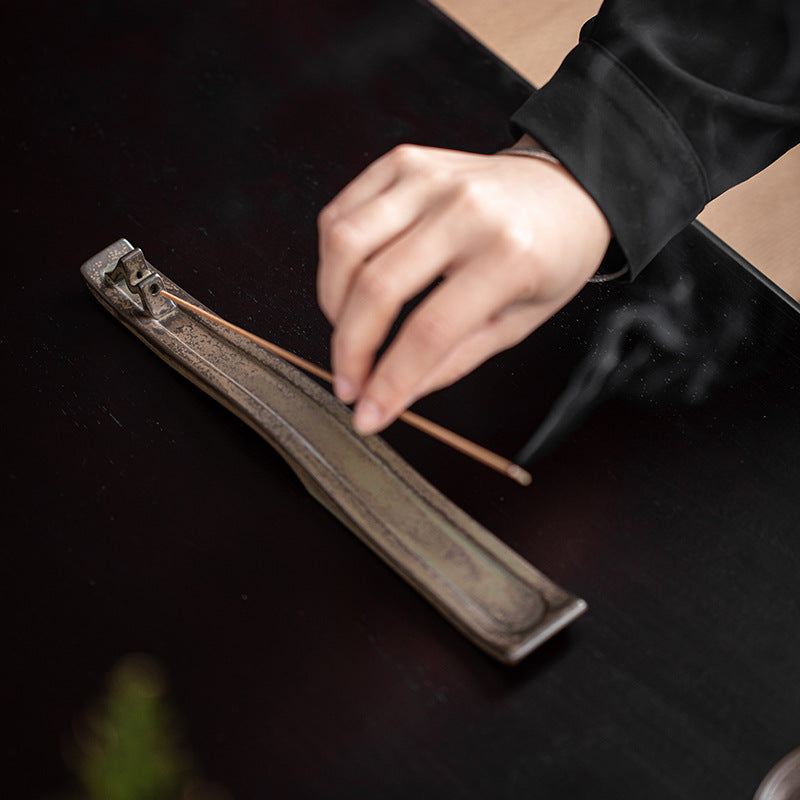 Side view of the incense holder for incense sticks
